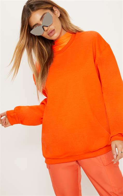 orange oversized sweatshirt